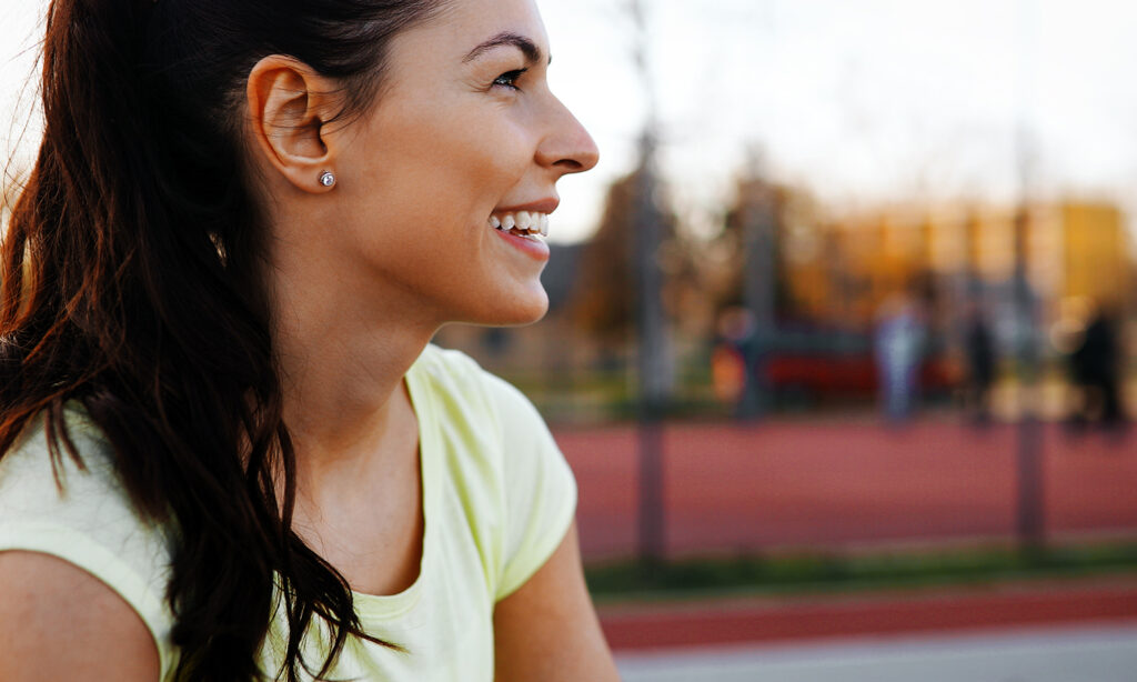 woman smiling after jogging